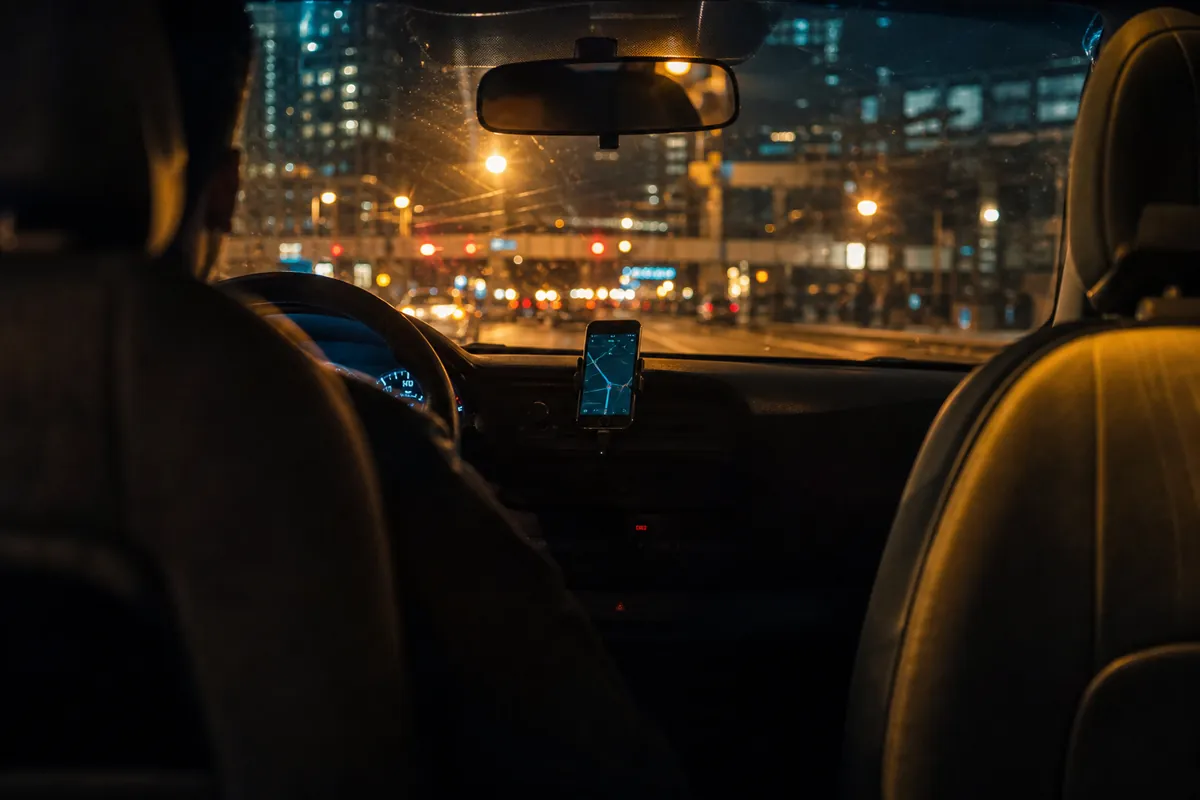 Rideshare vehicle at night